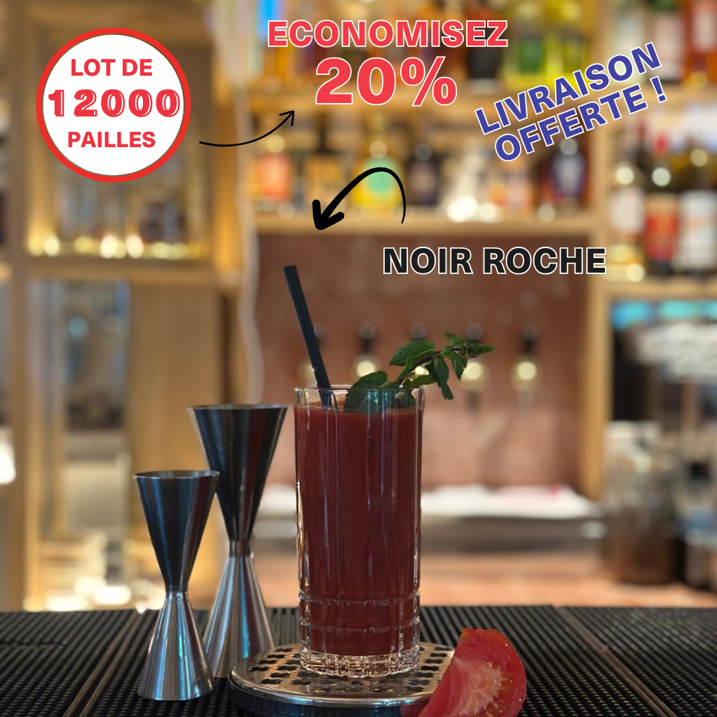 Paille en fibres végétales françaises de couleur noir roche dans un cocktail rouge avec feuille de menthe sur un bar professionnel. Livraison offerte pour un lot de 12 000 pailles et économies de 20%